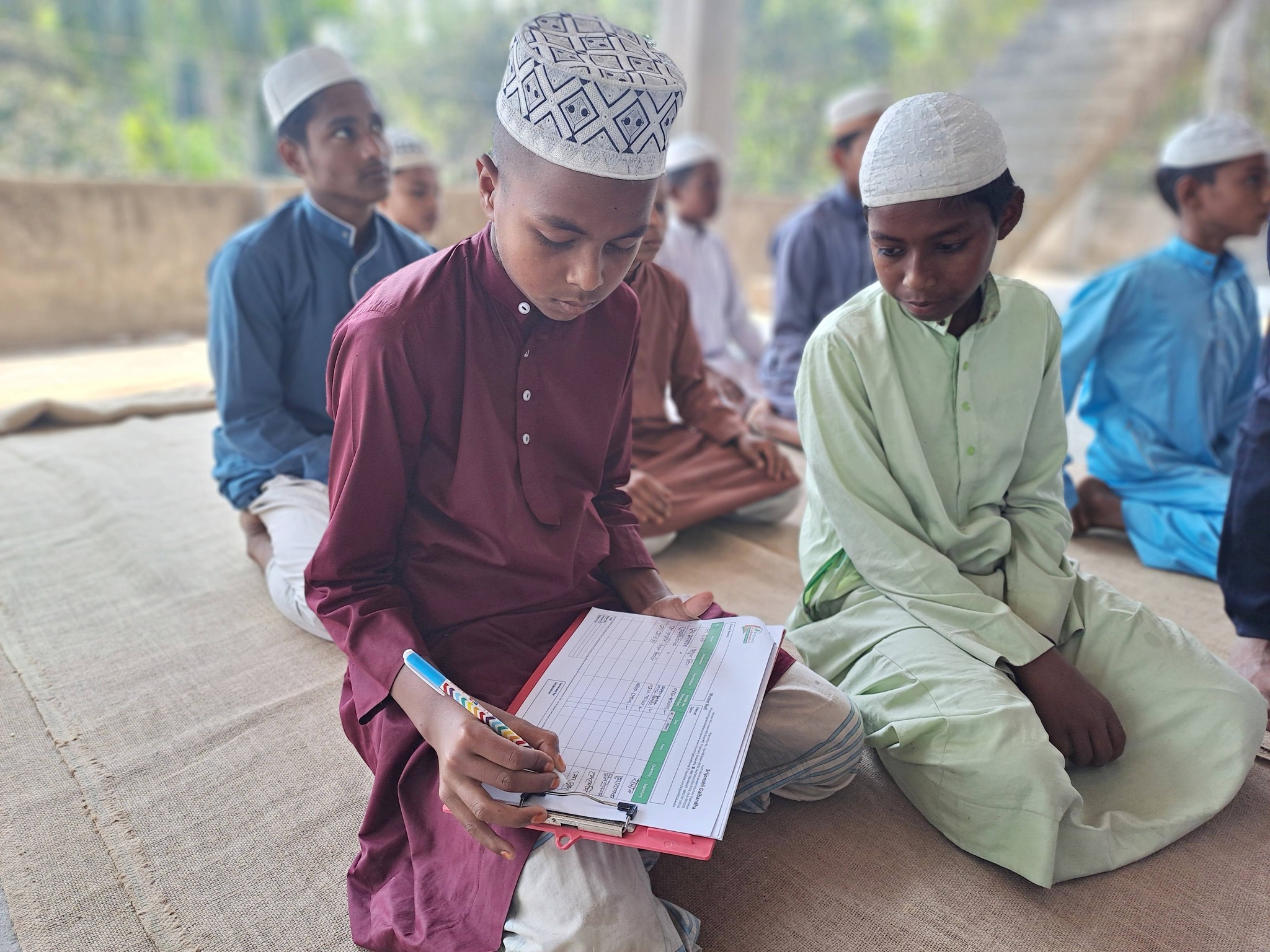 Distribution of the Holy Quran to Orphan Students in Kamarjani - Image 3
