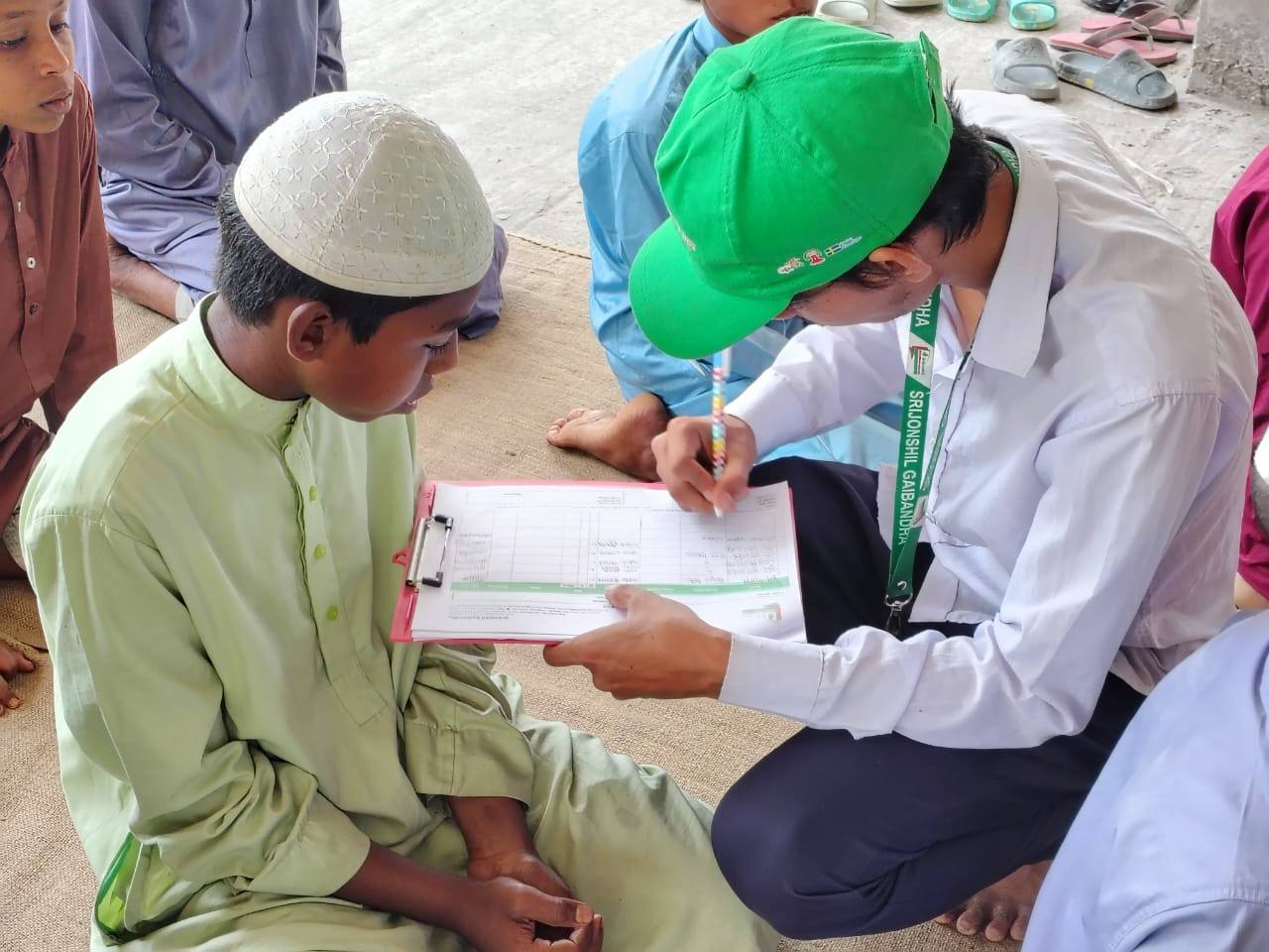 Distribution of the Holy Quran to Orphan Students in Kamarjani - Image 4